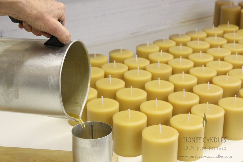 image of beeswax candles being poured